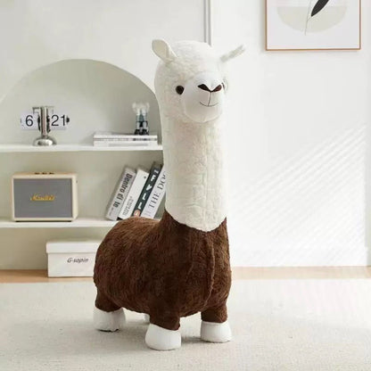 A Playful Knit Llama Accent Chair, with a plush white face and brown body design, sits snugly on the carpeted floor near shelves filled with books and decor items.