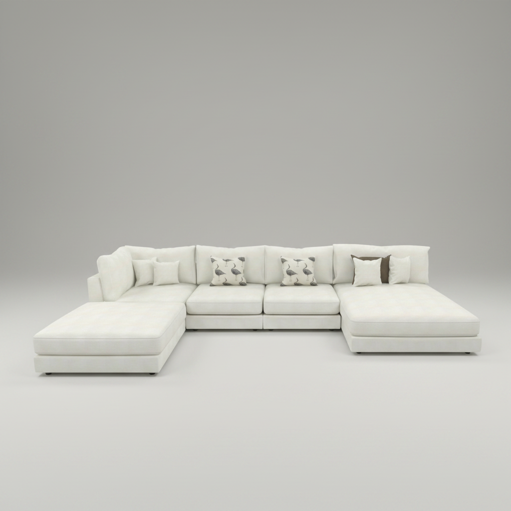 A modern sectional sofa in off-white upholstery with a chaise lounge on the left, several matching accent pillows, and two patterned throw pillows, shown on a plain white background.